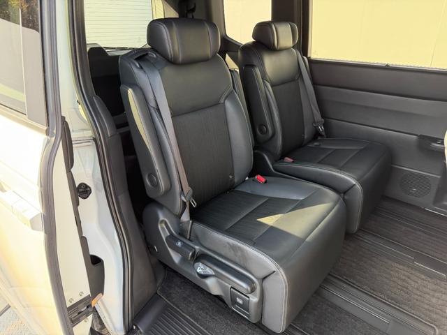 ステップワゴン e:HEVスパーダ ワンオーナー・障害物センサー・9インチ純ナビTV・Bluetooth・ホンダコネクト・Rカメラ・ETC・デュアルAAC・両パワスラ・オットマン・AW 1オーナー デュアルエアコン フルオートエアコン(63枚目)