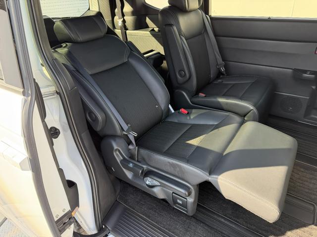 ステップワゴン e:HEVスパーダ ワンオーナー・障害物センサー・9インチ純ナビTV・Bluetooth・ホンダコネクト・Rカメラ・ETC・デュアルAAC・両パワスラ・オットマン・AW 1オーナー デュアルエアコン フルオートエアコン(65枚目)