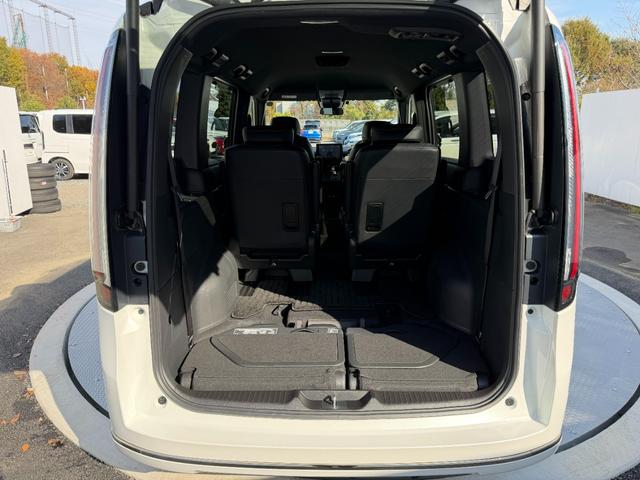 ステップワゴン e:HEVスパーダ ワンオーナー・障害物センサー・9インチ純ナビTV・Bluetooth・ホンダコネクト・Rカメラ・ETC・デュアルAAC・両パワスラ・オットマン・AW 1オーナー デュアルエアコン フルオートエアコン(68枚目)