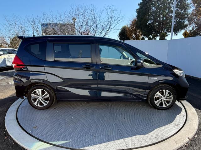 フリードハイブリッド ハイブリッド・Gホンダセンシング ワンオーナー・ドラレコ・7インチ純ナビTV・Bluetooth・インターナビ・Rカメラ・ETC・両パワスラ・スマートキー・LED 軽減ブレーキ キーフリーシステム 1オ-ナ- 記録簿 DVD再生可能(25枚目)