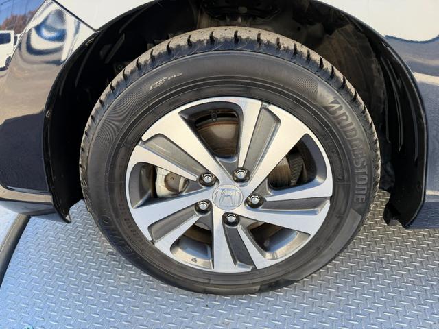 フリードハイブリッド ハイブリッド・Gホンダセンシング ワンオーナー・ドラレコ・7インチ純ナビTV・Bluetooth・インターナビ・Rカメラ・ETC・両パワスラ・スマートキー・LED 軽減ブレーキ キーフリーシステム 1オ-ナ- 記録簿 DVD再生可能(70枚目)