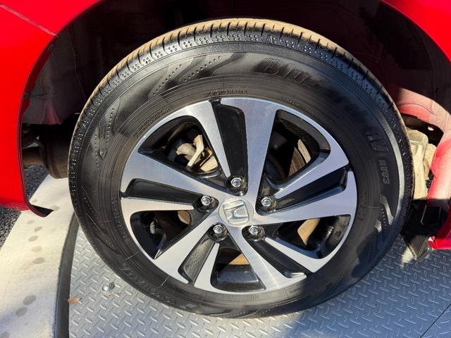 フリードハイブリッド ハイブリッド・Gホンダセンシング 禁煙・ワンオーナー・ドラレコ・9インチ純ナビTV・インターナビ・Rカメラ・AW・両パワスラ・スマートキー・LED 軽減ブレーキ キーフリーシステム 1オ-ナ- 記録簿 DVD再生可能 ECON ABS(65枚目)