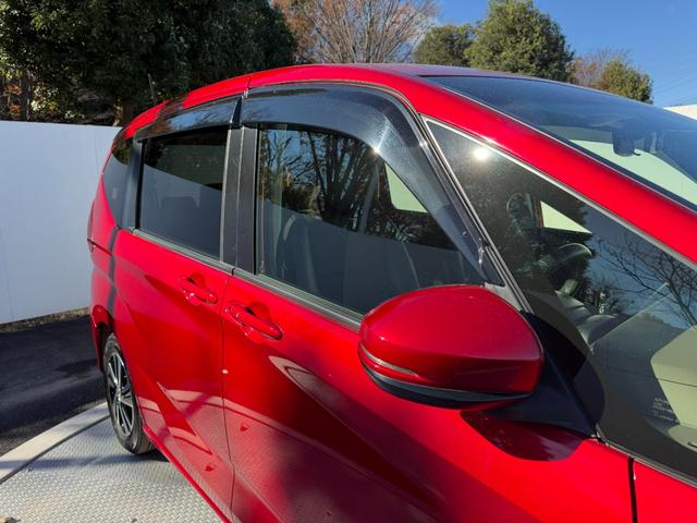 フリードハイブリッド ハイブリッド・Gホンダセンシング 禁煙・ワンオーナー・ドラレコ・9インチ純ナビTV・インターナビ・Rカメラ・AW・両パワスラ・スマートキー・LED 軽減ブレーキ キーフリーシステム 1オ-ナ- 記録簿 DVD再生可能 ECON ABS(68枚目)