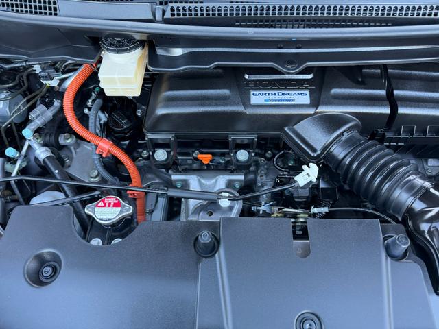 ステップワゴンスパーダ e:HEVスパーダG・EXホンダセンシング ワンオーナー・ドラレコ・10インチ純ナビTV・インターナビ・マルチビューカメラ・ETC・LED・AW エアバック 地デジ クルコン サイドエアバッグ シ-トヒ-タ- 衝突軽減システム 1オーナー(64枚目)