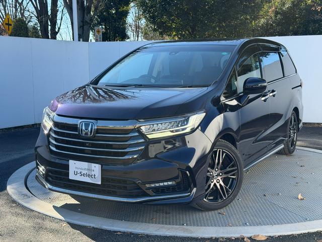 オデッセイハイブリッド ｅ：ＨＥＶアブソルート・ＥＸ　１０インチ純ナビ・Ｂｌｕｅｔｏｏｔｈ・ドラレコ・障害物センサー・シートヒーター・オットマン・インターナビ・ＬＥＤ・ＥＴＣ　ＬＥＤライト　シ－トヒ－タ－　両側ＰＳＤ　整備記録簿　フルセグ　ＤＶＤ再生機能（28枚目）