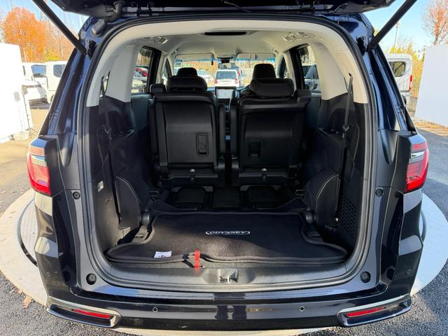 オデッセイハイブリッド ｅ：ＨＥＶアブソルート・ＥＸ　１０インチ純ナビ・Ｂｌｕｅｔｏｏｔｈ・ドラレコ・障害物センサー・シートヒーター・オットマン・インターナビ・ＬＥＤ・ＥＴＣ　ＬＥＤライト　シ－トヒ－タ－　両側ＰＳＤ　整備記録簿　フルセグ　ＤＶＤ再生機能（49枚目）