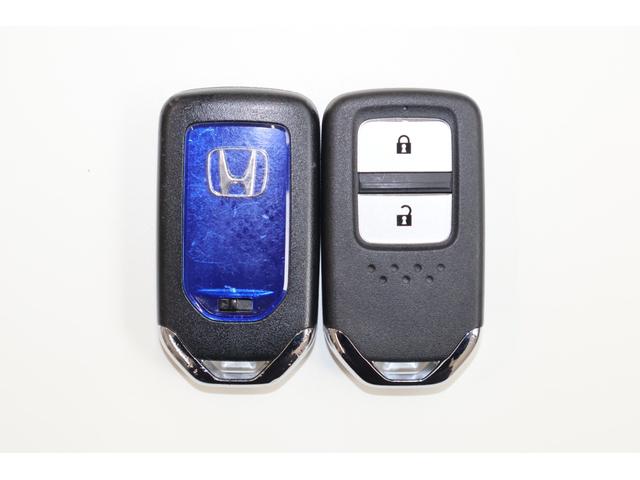 ジェイド ハイブリッドX 純ナビ Bカメ LED スマキー2個 地デジフルセグ 踏み間違い防止装置 横滑り防止 サイドカーテンエアバック ナビTV クルコン パワーウィンドウ キーレス 三列シート ETC装備 DVD再生 AC(32枚目)