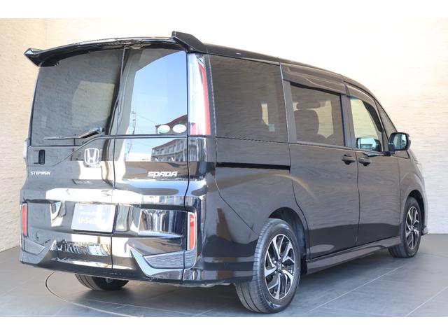 ステップワゴンスパーダ スパーダホンダセンシング 純正Mナビ 後席モニター ドラレコ 盗難防止 助手席エアバッグ ワンオーナ- Wパワスラ 記録簿有 地デジ サイドエアバッグ LEDライト 横滑り防止システム オートエアコン リアカメラ ナビ&TV(8枚目)
