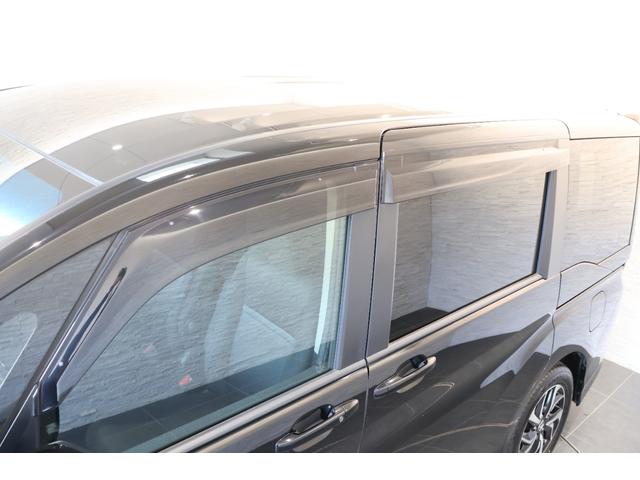 ステップワゴンスパーダ スパーダホンダセンシング 純正Mナビ 後席モニター ドラレコ 盗難防止 助手席エアバッグ ワンオーナ- Wパワスラ 記録簿有 地デジ サイドエアバッグ LEDライト 横滑り防止システム オートエアコン リアカメラ ナビ&TV(30枚目)