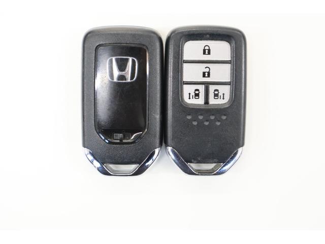 ステップワゴンスパーダ スパーダホンダセンシング 純正Mナビ 後席モニター ドラレコ 盗難防止 助手席エアバッグ ワンオーナ- Wパワスラ 記録簿有 地デジ サイドエアバッグ LEDライト 横滑り防止システム オートエアコン リアカメラ ナビ&TV(35枚目)