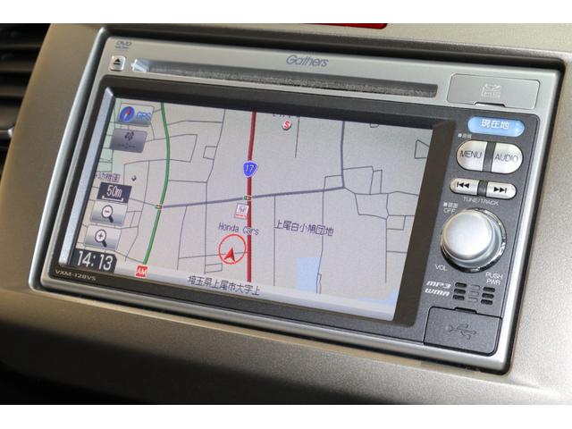 フリードスパイクハイブリッド ジャストセレクション 純正ナビ 左側パワスラ Bカメ Sキー キーフリー セキュリティーアラーム 横滑り防止機能 DVD視聴 後カメラ ワンセグTV ナビTV エアコン 記録簿 フルフラットシート 両側スライド片側電動(4枚目)