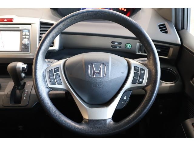 フリードスパイクハイブリッド ジャストセレクション 純正ナビ 左側パワスラ Bカメ Sキー キーフリー セキュリティーアラーム 横滑り防止機能 DVD視聴 後カメラ ワンセグTV ナビTV エアコン 記録簿 フルフラットシート 両側スライド片側電動(12枚目)