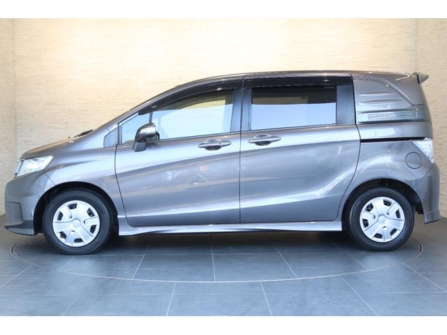 フリードスパイクハイブリッド ジャストセレクション 純正ナビ 左側パワスラ Bカメ Sキー キーフリー セキュリティーアラーム 横滑り防止機能 DVD視聴 後カメラ ワンセグTV ナビTV エアコン 記録簿 フルフラットシート 両側スライド片側電動(24枚目)