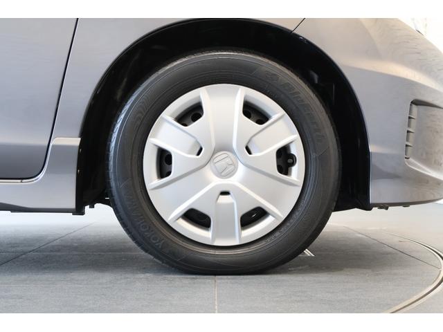 フリードスパイクハイブリッド ジャストセレクション 純正ナビ 左側パワスラ Bカメ Sキー キーフリー セキュリティーアラーム 横滑り防止機能 DVD視聴 後カメラ ワンセグTV ナビTV エアコン 記録簿 フルフラットシート 両側スライド片側電動(30枚目)