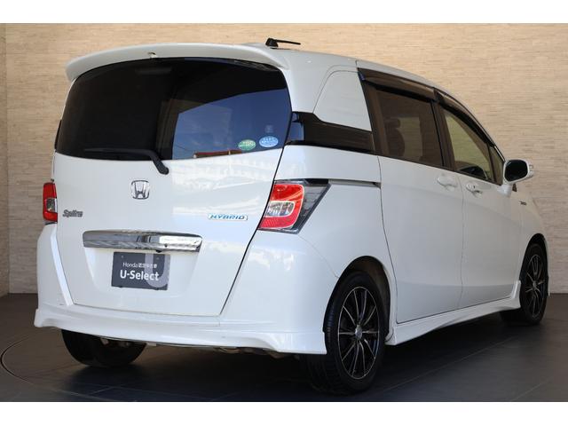 フリードハイブリッド ハイブリッドプレミアムエディション　純ナビ　両パワスラ　社外アルミ　Ｂカメラ　ＥＴＣ　Ｒカメ　ＵＳＢ　横滑り防止　両側電動ＳＤ　ＤＶＤ　オートクルーズコントロール　キーフリー　スマートキーシステム　ワンセグ　エアコン　パワーウィンドウ（23枚目）