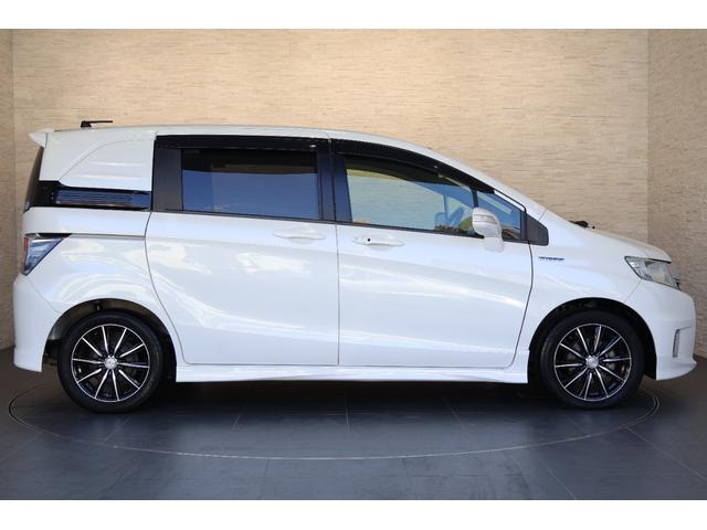 フリードハイブリッド ハイブリッドプレミアムエディション　純ナビ　両パワスラ　社外アルミ　Ｂカメラ　ＥＴＣ　Ｒカメ　ＵＳＢ　横滑り防止　両側電動ＳＤ　ＤＶＤ　オートクルーズコントロール　キーフリー　スマートキーシステム　ワンセグ　エアコン　パワーウィンドウ（24枚目）