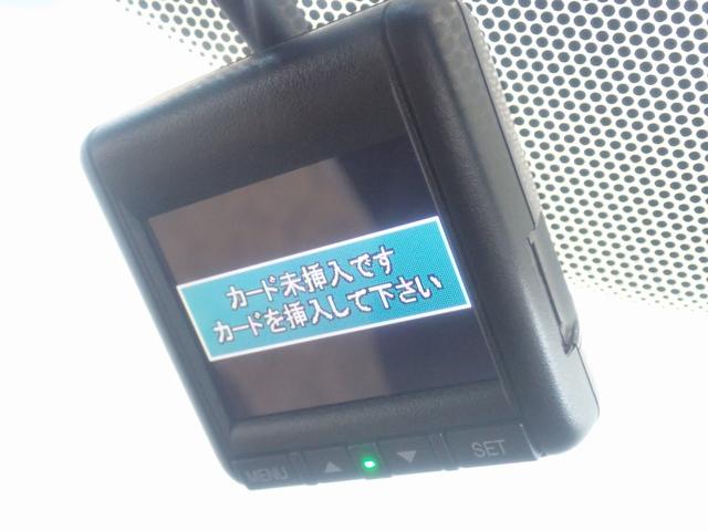 スパーダホンダセンシング　９インチプレミアムインターナビリア席モニター　盗難防止装置　ＶＳＡ　地デジ　Ｗエアコン　ＬＥＤライト　三列シート　リアカメラ　Ａクルーズ　オートエアコン　スマートキー　ＤＶＤ　ＥＴＣ車載器　キーフリー(5枚目)