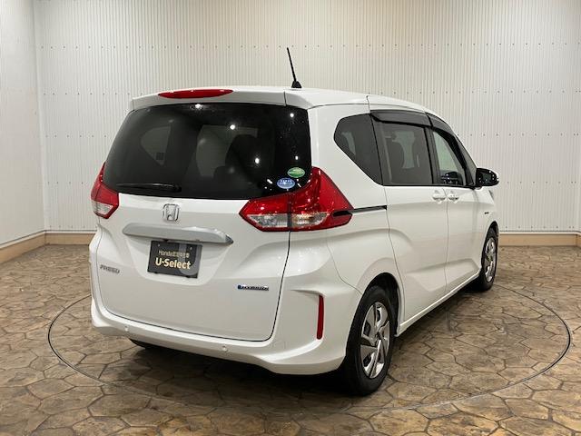 フリードハイブリッド ハイブリッド・Ｇホンダセンシング　６人乗り　メモリーナビ　前後ドラレコ　軽減ブレーキ　キーフリーシステム　ＤＶＤ再生可能　ＥＣＯＮ　後カメラ　Ａクルーズ　地デジフルセグＴＶ　ＬＥＤヘッドランプ　横滑防止　ドライブレコーダ　３列シート（4枚目）