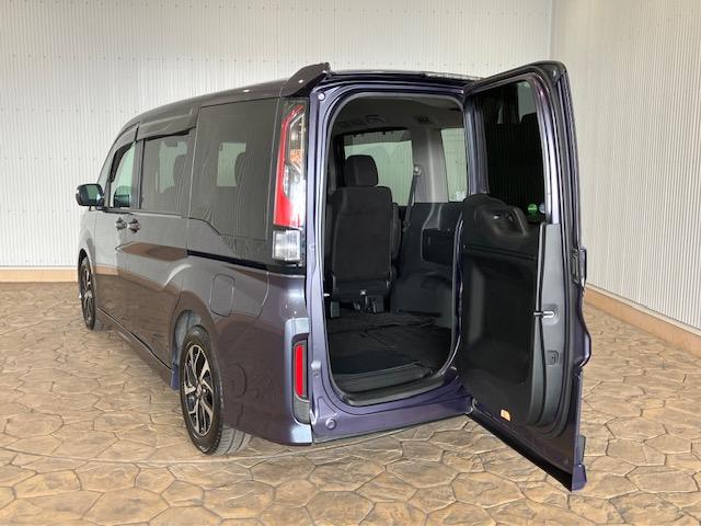 ステップワゴンスパーダ スパーダホンダセンシング 10インチプレミアムインターナビ リア席モニター 前後ドラレコ わくわくゲート ETC 盗難防止 助手席エアバッグ Wパワスラ リアオートエアコン 地デジ LEDライト 横滑り防止システム リアカメラ(4枚目)