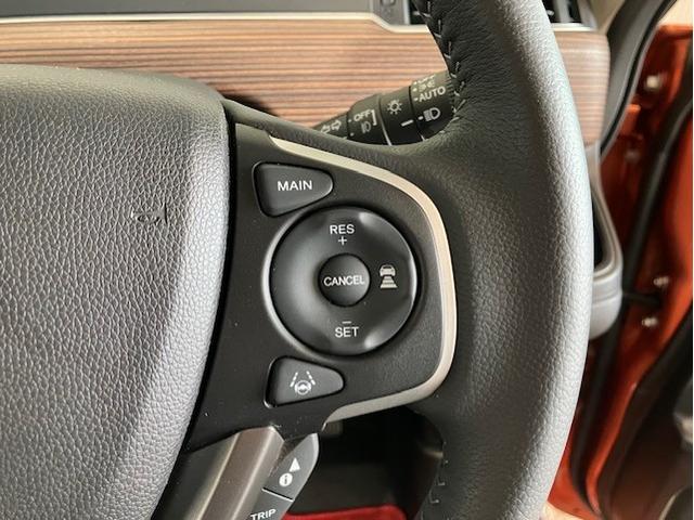 フリード+ハイブリッド ハイブリッド・クロスターホンダセンシング ディスプレイオーディオ 前後ドラレコ 無限フロアマット ETC CD再生対応 Bluetooth対応 アルミホイール バックカメラ シートヒーター サイドエアバッグ LEDヘッドライト スマートキー(12枚目)