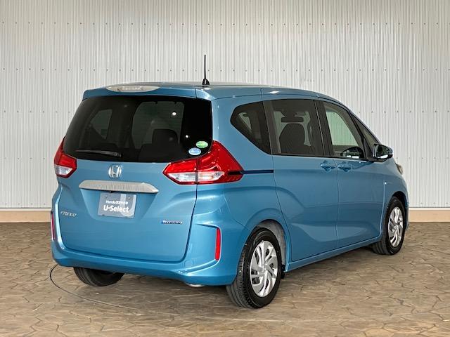 フリードハイブリッド ハイブリッド・Gホンダセンシング 9インチプレミアムインターナビ 7人乗り 軽減ブレーキ キーフリーシステム DVD再生可能 ECON 後カメラ Aクルーズ 地デジフルセグTV 横滑防止 パワーウインドウ 3列シート ETC付 ABS(3枚目)