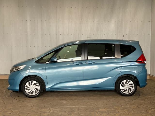 フリードハイブリッド ハイブリッド・Gホンダセンシング 9インチプレミアムインターナビ 7人乗り 軽減ブレーキ キーフリーシステム DVD再生可能 ECON 後カメラ Aクルーズ 地デジフルセグTV 横滑防止 パワーウインドウ 3列シート ETC付 ABS(6枚目)