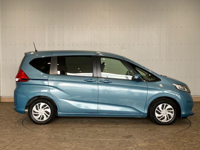 フリードハイブリッド ハイブリッド・Gホンダセンシング 9インチプレミアムインターナビ 7人乗り 軽減ブレーキ キーフリーシステム DVD再生可能 ECON 後カメラ Aクルーズ 地デジフルセグTV 横滑防止 パワーウインドウ 3列シート ETC付 ABS(9枚目)