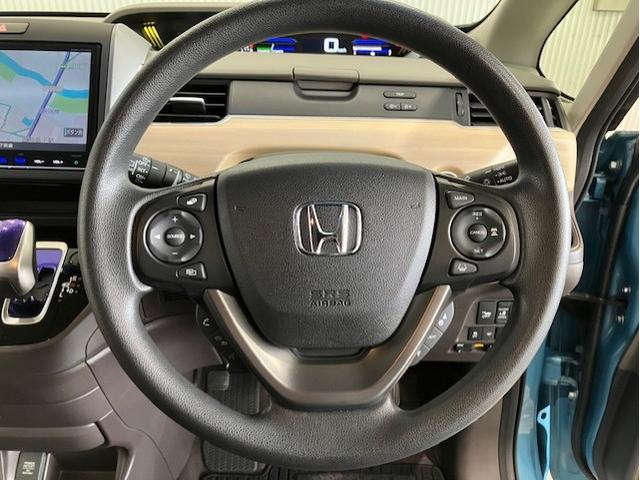 フリードハイブリッド ハイブリッド・Gホンダセンシング 9インチプレミアムインターナビ 7人乗り 軽減ブレーキ キーフリーシステム DVD再生可能 ECON 後カメラ Aクルーズ 地デジフルセグTV 横滑防止 パワーウインドウ 3列シート ETC付 ABS(19枚目)