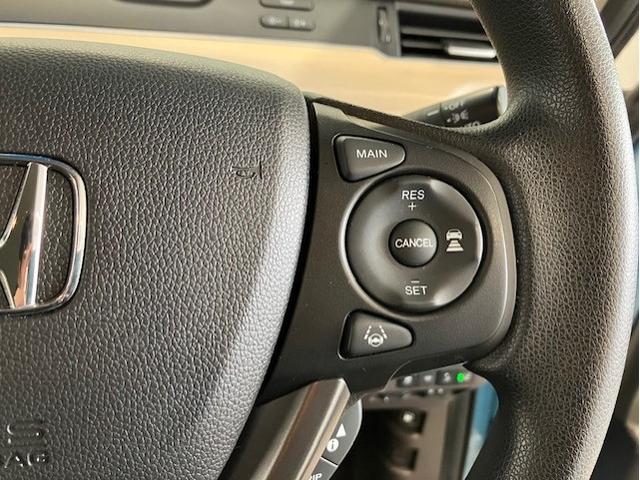 フリードハイブリッド ハイブリッド・Gホンダセンシング 9インチプレミアムインターナビ 7人乗り 軽減ブレーキ キーフリーシステム DVD再生可能 ECON 後カメラ Aクルーズ 地デジフルセグTV 横滑防止 パワーウインドウ 3列シート ETC付 ABS(21枚目)