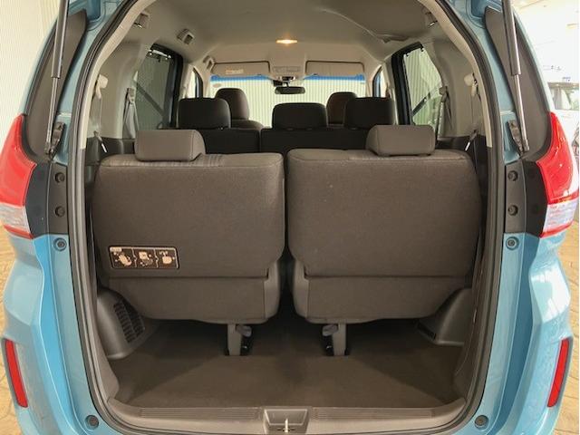 フリードハイブリッド ハイブリッド・Gホンダセンシング 9インチプレミアムインターナビ 7人乗り 軽減ブレーキ キーフリーシステム DVD再生可能 ECON 後カメラ Aクルーズ 地デジフルセグTV 横滑防止 パワーウインドウ 3列シート ETC付 ABS(28枚目)