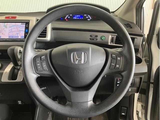 フリード Gプレミアムエディション 6人乗り メモリーナビ 両側パワースライドドア 地デジTV 盗難防止 VSA Bカメラ オートクルーズ パワステ AAC ETC車載器 3列シート パワーウィンド ABS Wエアバック エアバッグ(22枚目)