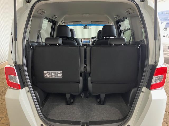 フリード Gプレミアムエディション 6人乗り メモリーナビ 両側パワースライドドア 地デジTV 盗難防止 VSA Bカメラ オートクルーズ パワステ AAC ETC車載器 3列シート パワーウィンド ABS Wエアバック エアバッグ(28枚目)