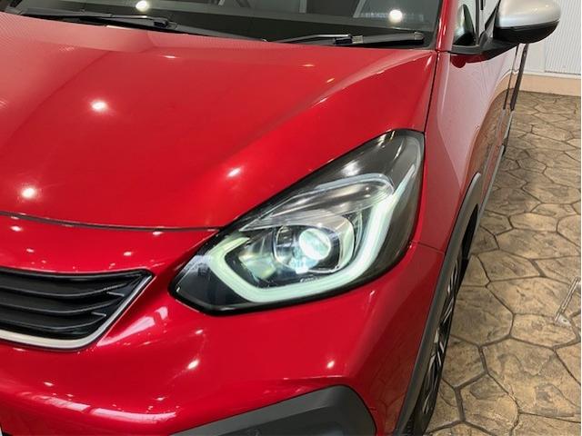 フィット e:HEVクロスター 4WDホンダセンシング 9インチプレミアムインターナビ オールシーズンマット 前後ドラレコ アルミホイール フルセグTV Bluetooth対応 衝突回避システム フルオートエアコン LEDランプ(19枚目)
