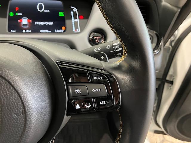 フィット e:HEVRS ホンダセンシング 9インチプレミアムインターナビ 前後ドラレコ パドルシフト アルミホイール エアバッグ ナビ&TV パワーウィンドウ 助手席エアバッグ Dレコ フルセグテレビ LEDヘッドランプ(12枚目)