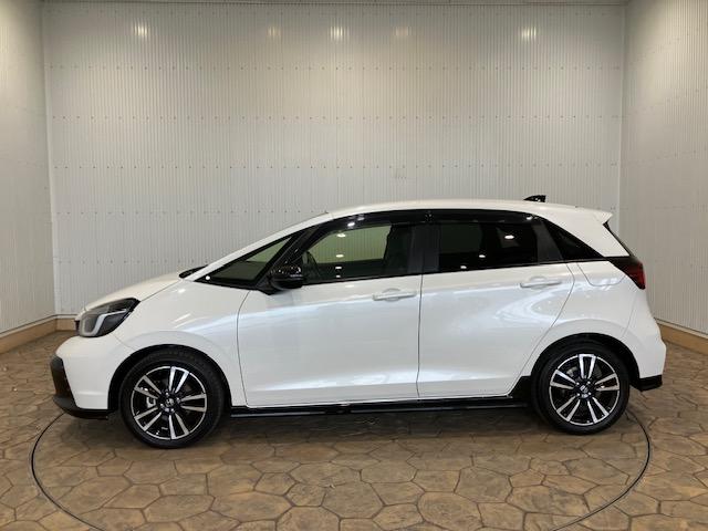 フィット e:HEVRS ホンダセンシング 9インチプレミアムインターナビ 前後ドラレコ パドルシフト アルミホイール エアバッグ ナビ&TV パワーウィンドウ 助手席エアバッグ Dレコ フルセグテレビ LEDヘッドランプ(13枚目)