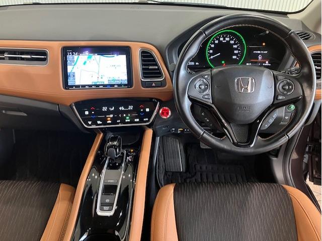 ヴェゼル ハイブリッドＺ・ホンダセンシング　８インチプレミアムインターナビ　前後ドラレコ　パドルシフト　ＥＴＣ　アルミホイール　レーダーサポート　Ｗエアコン　ＤＶＤ再生機能　横滑り防止システム　バックアイカメラ　盗難防止装置　フルセ　ナビ＆ＴＶ（9枚目）