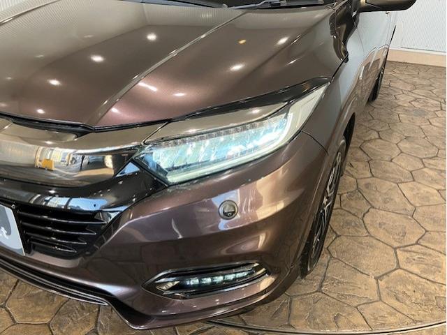 ヴェゼル ハイブリッドＺ・ホンダセンシング　８インチプレミアムインターナビ　前後ドラレコ　パドルシフト　ＥＴＣ　アルミホイール　レーダーサポート　Ｗエアコン　ＤＶＤ再生機能　横滑り防止システム　バックアイカメラ　盗難防止装置　フルセ　ナビ＆ＴＶ（18枚目）
