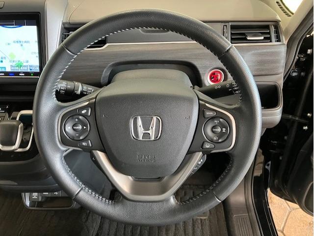 フリードハイブリッド ハイブリッド・Ｇホンダセンシング　９インチプレミアムインターナビ　前後ドラレコ　ＥＴＣ　アルミホイール　６人乗り　軽減ブレーキ　キーフリーシステム　ＤＶＤ再生可能　ＥＣＯＮ　後カメラ　Ａクルーズ　地デジフルセグＴＶ　ＬＥＤヘッドランプ（9枚目）