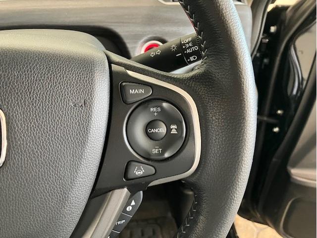 フリードハイブリッド ハイブリッド・Ｇホンダセンシング　９インチプレミアムインターナビ　前後ドラレコ　ＥＴＣ　アルミホイール　６人乗り　軽減ブレーキ　キーフリーシステム　ＤＶＤ再生可能　ＥＣＯＮ　後カメラ　Ａクルーズ　地デジフルセグＴＶ　ＬＥＤヘッドランプ（11枚目）