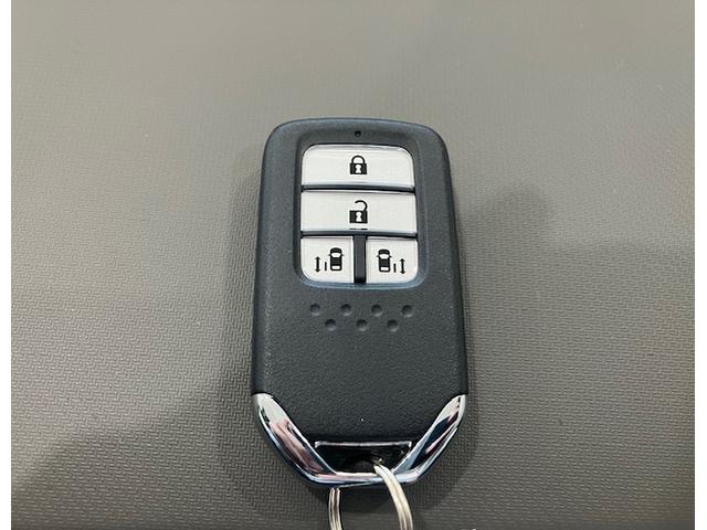 フリードハイブリッド ハイブリッド・Ｇホンダセンシング　９インチプレミアムインターナビ　前後ドラレコ　ＥＴＣ　アルミホイール　６人乗り　軽減ブレーキ　キーフリーシステム　ＤＶＤ再生可能　ＥＣＯＮ　後カメラ　Ａクルーズ　地デジフルセグＴＶ　ＬＥＤヘッドランプ（31枚目）