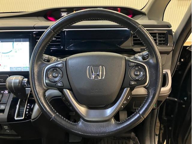 ステップワゴンスパーダ スパーダホンダセンシング　ドラレコ前後　１０インチプレミアムナビ　リア席モニター　７人乗り　盗難防止　助手席エアバッグ　Ｗパワスラ　リアオートエアコン　地デジ　ＬＥＤライト　横滑り防止システム　オートエアコン　リアカメラ（10枚目）