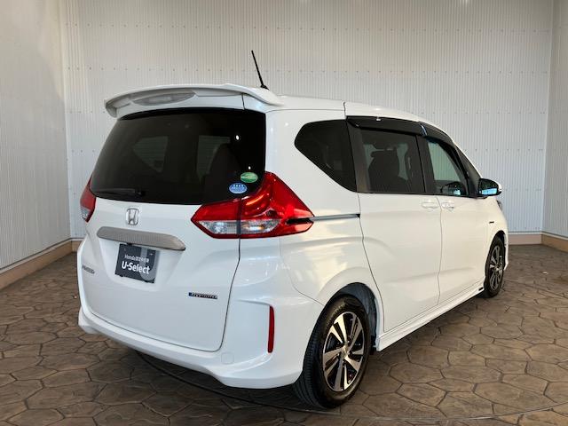フリードハイブリッド ハイブリッド・EX 前ドラレコ ホンダセンシング メモリーナビ ETC 地デジフルセグTV シ-トヒ-タ- リヤカメラ LEDライト フルオートエアコン ABS DVD再生可 サイドエアバッグ キーフリー ナビ&TV(4枚目)