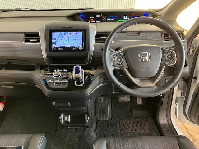 フリードハイブリッド ハイブリッド・EX 前ドラレコ ホンダセンシング メモリーナビ ETC 地デジフルセグTV シ-トヒ-タ- リヤカメラ LEDライト フルオートエアコン ABS DVD再生可 サイドエアバッグ キーフリー ナビ&TV(7枚目)