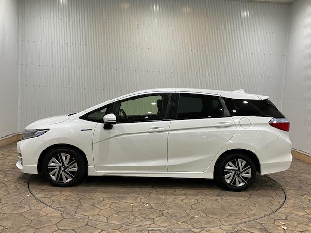 シャトル ハイブリッドXホンダセンシング メモリーナビ パドルシフト シートヒーターETC 横滑抑制 リヤカメラ スマ-トキ- イモビ TVナビ サイドエアバッグ シートヒーター付き キーレス DVD再生機能 ECON クルコン Wエアバック(11枚目)