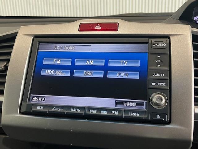 フリードハイブリッド ジャストセレクション　ホンダ純正ナビ　左リア側電動スライドドア　両側スライド片側電動ドア　ナビテレビ　セキュリティー　横滑り防止機能　オートクルーズ　エアバック　ＤＶＤ再生可能　キーレスエントリー　ワンセグＴＶ　ＰＳ　３列（12枚目）