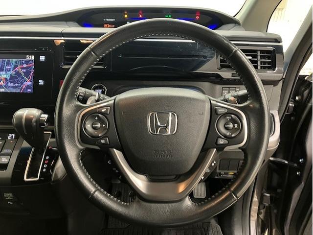 ステップワゴンスパーダ スパーダホンダセンシング　ホンダ純正ナビ　両側電動スライドドア　盗難防止　助手席エアバッグ　Ｗパワスラ　地デジ　サイドエアバッグ　ＬＥＤライト　横滑り防止システム　オートエアコン　リアカメラ　ナビ＆ＴＶ　三列シート　ＥＴＣ付（20枚目）