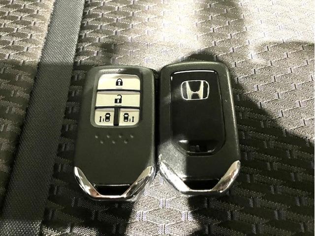 ステップワゴンスパーダ スパーダホンダセンシング　ホンダ純正ナビ　両側電動スライドドア　盗難防止　助手席エアバッグ　Ｗパワスラ　地デジ　サイドエアバッグ　ＬＥＤライト　横滑り防止システム　オートエアコン　リアカメラ　ナビ＆ＴＶ　三列シート　ＥＴＣ付（32枚目）