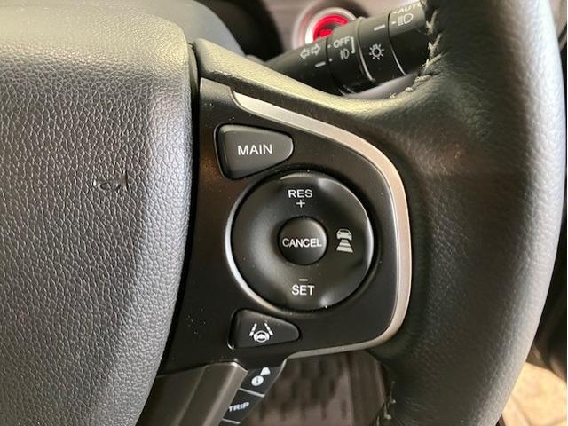 フリード＋ハイブリッド ハイブリッドＥＸ　メモリーナビ　ホンダセンシング　シートバックテーブル　盗難防止システム　衝突軽減システム　オートクルーズコントロール　地デジフルセグ　キーレス　スマートキ　バックカメラ　シートＨ　ＡＢＳ　ＥＴＣ（9枚目）