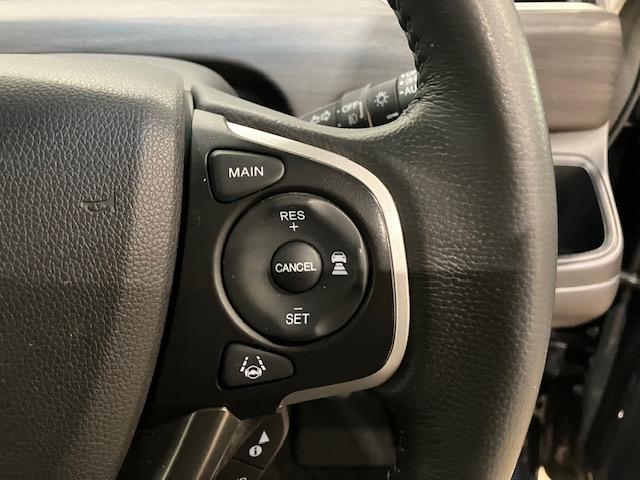 フリードハイブリッド ハイブリッド・Ｇホンダセンシング　前後ドラレコ　９インチナビ　ＥＴＣ　軽減ブレーキ　キーフリーシステム　ＤＶＤ再生可能　サイドカーテンエアバック　ＥＣＯＮ　後カメラ　Ａクルーズ　地デジフルセグＴＶ　ＬＥＤヘッドランプ　横滑防止　ＡＢＳ（21枚目）