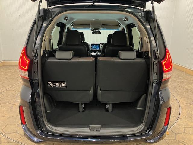 フリードハイブリッド ハイブリッド・Ｇホンダセンシング　前後ドラレコ　９インチナビ　ＥＴＣ　軽減ブレーキ　キーフリーシステム　ＤＶＤ再生可能　サイドカーテンエアバック　ＥＣＯＮ　後カメラ　Ａクルーズ　地デジフルセグＴＶ　ＬＥＤヘッドランプ　横滑防止　ＡＢＳ（29枚目）